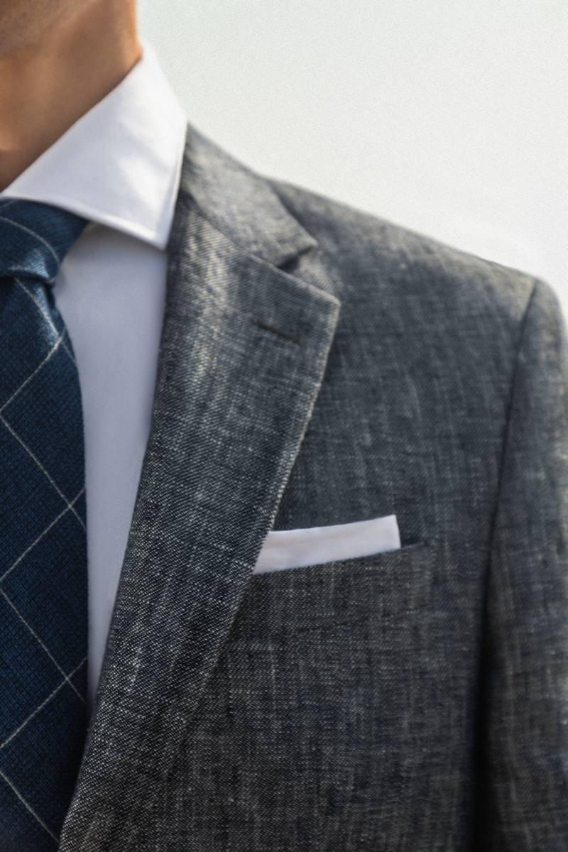 linen suit with tie